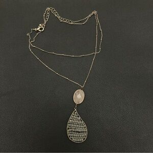 Elegant Gold and Silver Pendant Necklace